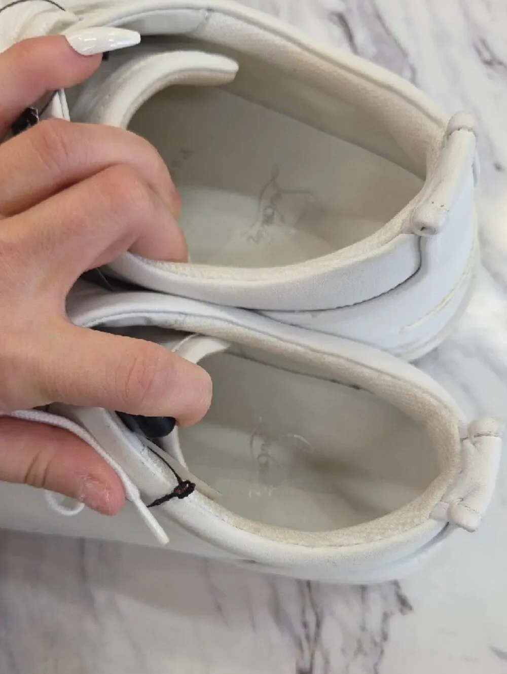 Christian Louboutin White Low-Top Leather Sneakers with Red Heel Accent